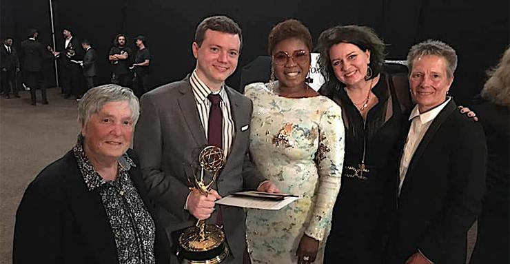 University of San Diego alumnus Jared Ruga celebrates with Dr. Kristen Ries (far left) and Maggie Snyder (far right) after their film documentary, Quiet Heroes, won a Daytime Emmy Award on May 3.