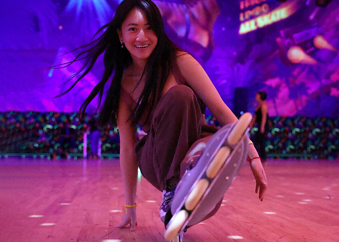 Anita Duong '23 (MA) strikes a pose while rollerskating at Skateworld in Linda Vista. Duong was a Torero Renaissance Scholar and now hopes to teach and inspire underserved youth with similar backgrounds to her own. (Photo by Barbara Ferguson)