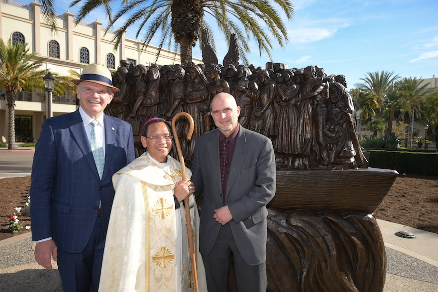 USD President James T. Harris, III, DEd (left) Most Rev. Bishop Michael Pham (center) and Angels Unawares Sculptor Timothy Schmalz (right) at the Angels Unawares dedication event on Dec. 18 (photo: Lauren Raddack)
