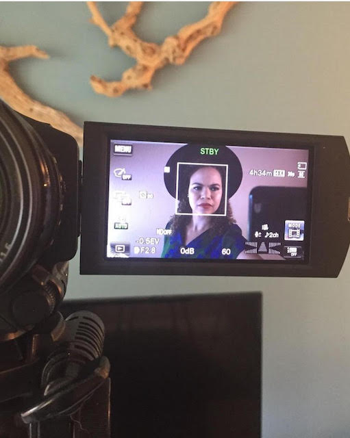 Student, Sarah Joyce, testing microphone levels at home