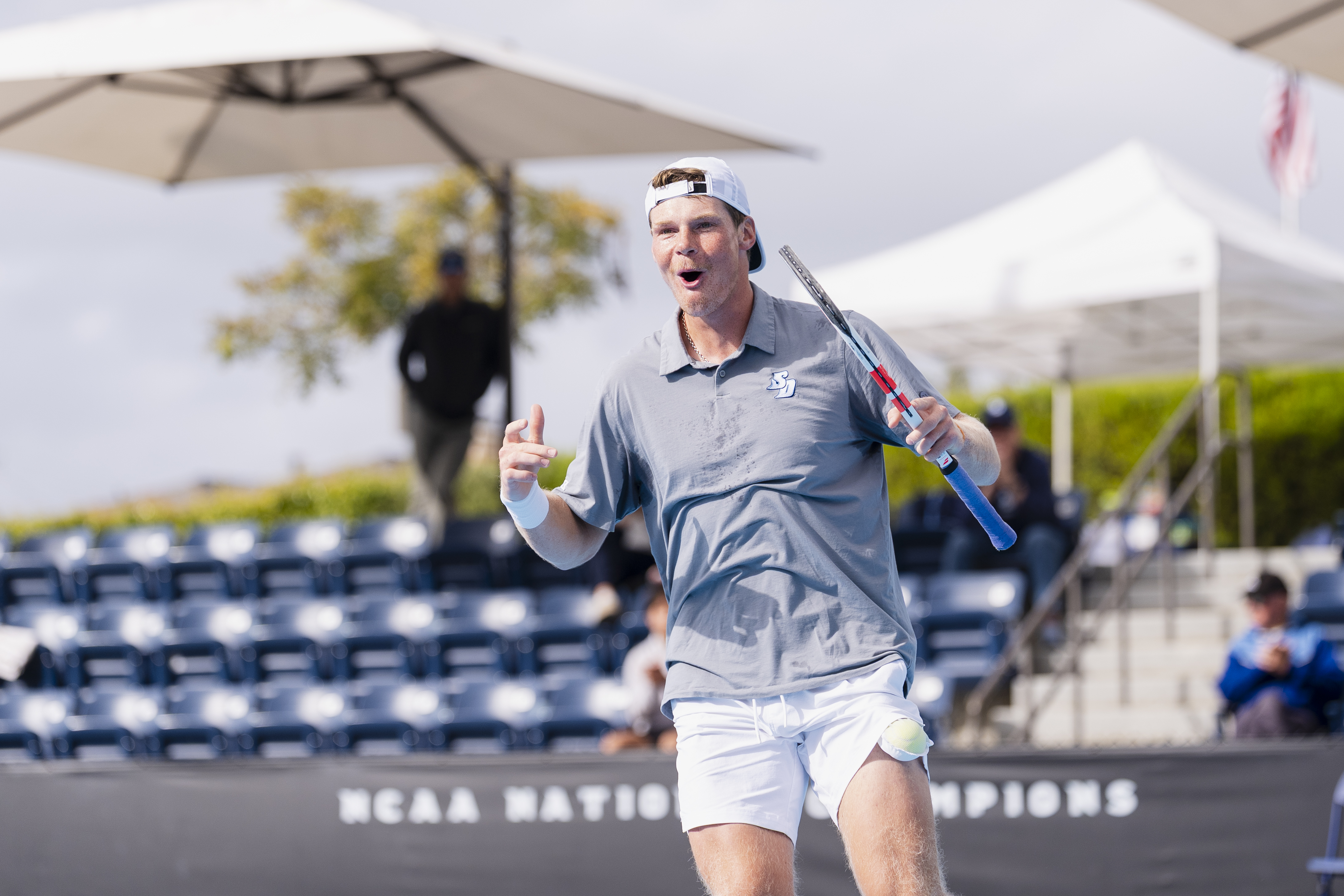 Men's Tennis Player Celebrating 