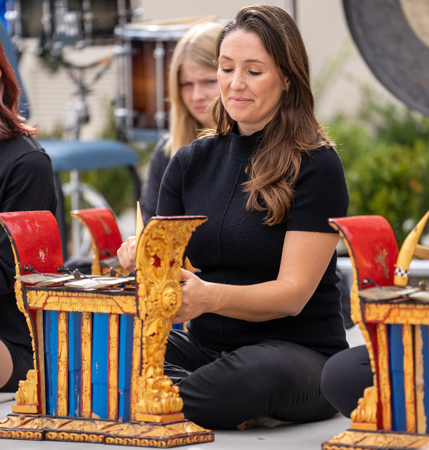 Meghan Hynson playing the Balinese gamelan.