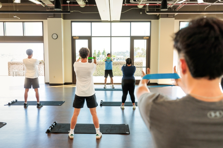 Students working out together in a Group Fitness class