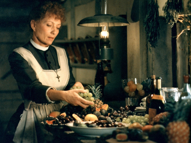 A still from the film Babette's Feast featuring Babette in …