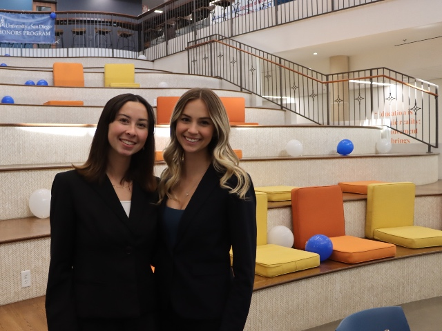 Photograph of two honors students at a previous honors …