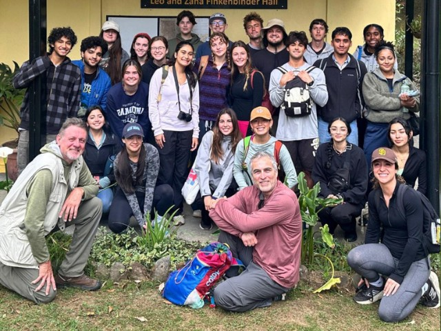 Students and teachers take a group picture before a hike in Costa Rica.