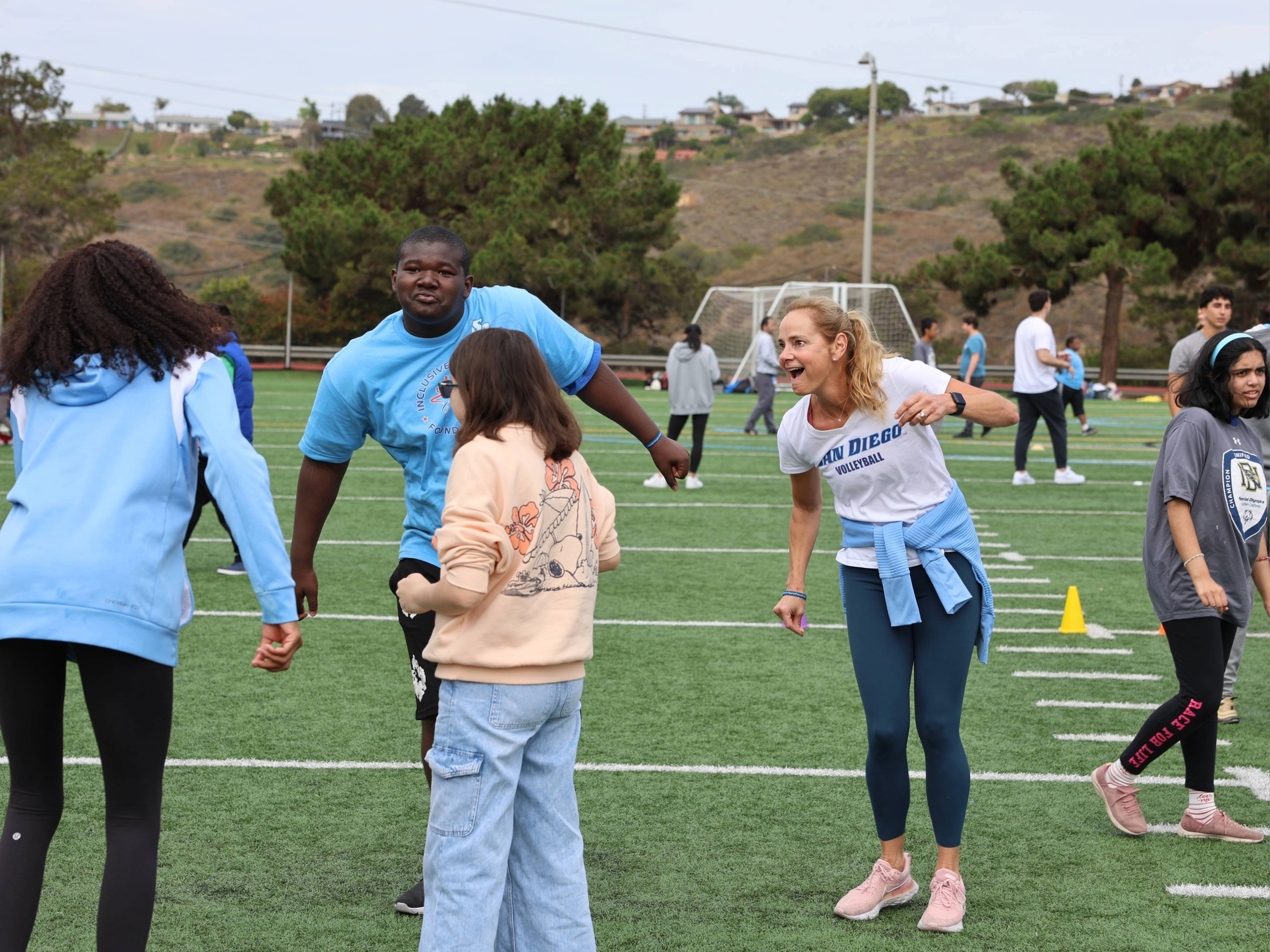 There were stations for sports activities, but dancing at midfield may have drawn the biggest crowd of kids and Toreros alike. (Photo: Steven Covella)