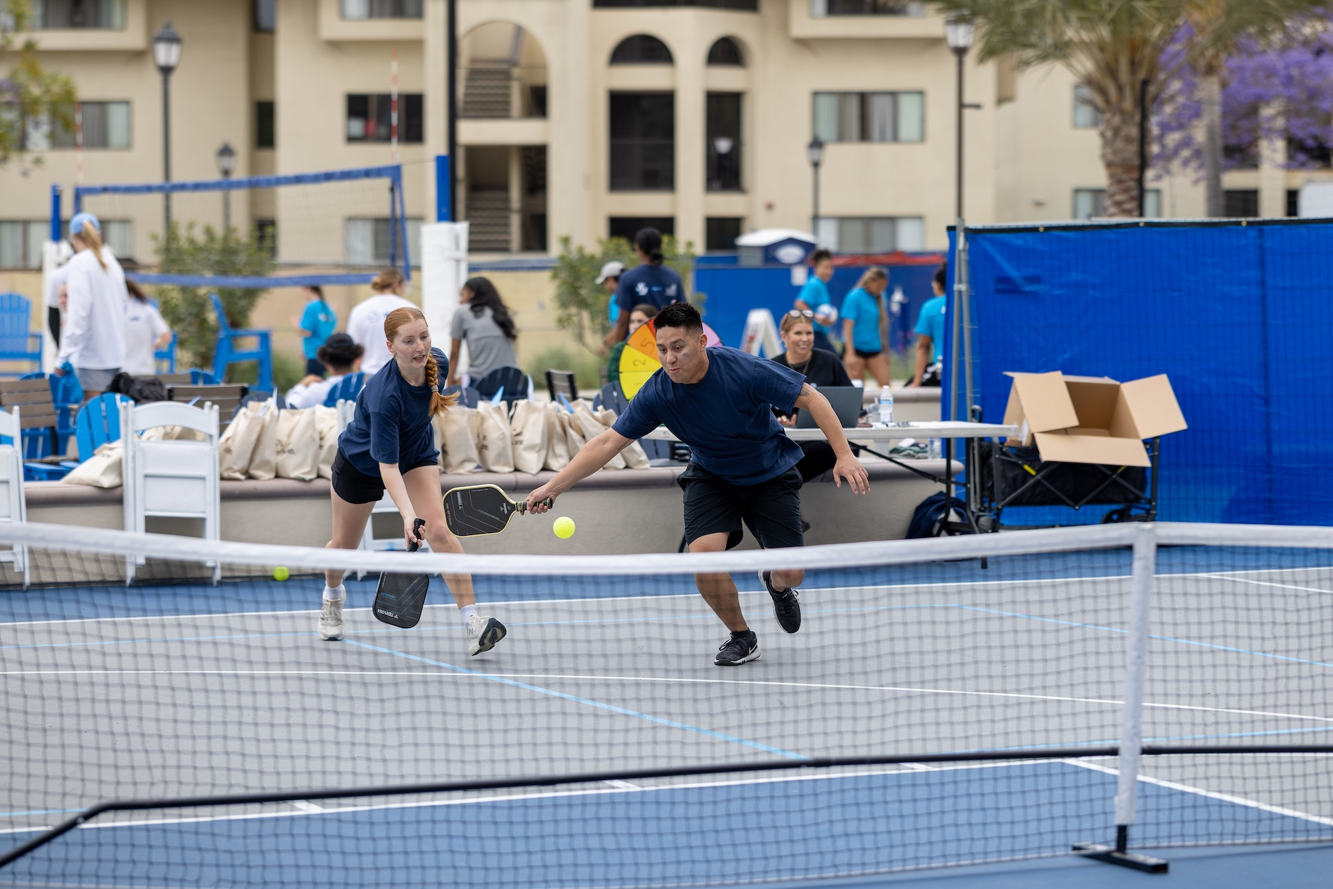 "I got it. No, I got it!" - Pickleball participants at the inaugural Wellness Olympics event (Photo: Alé Delgado)