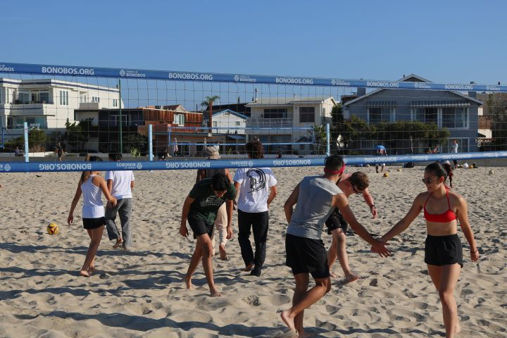 USD students playing sand volleyball in Mission Beach