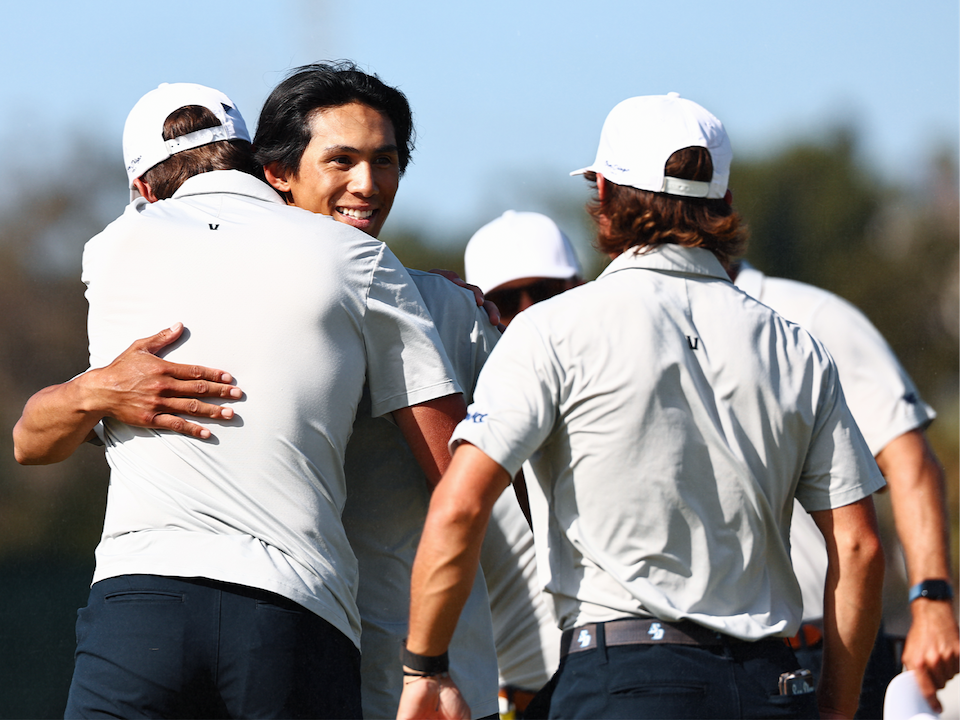 USD Men's Golf Redshirt Senior Ian Maspat embraces teammates at NCAA Championship