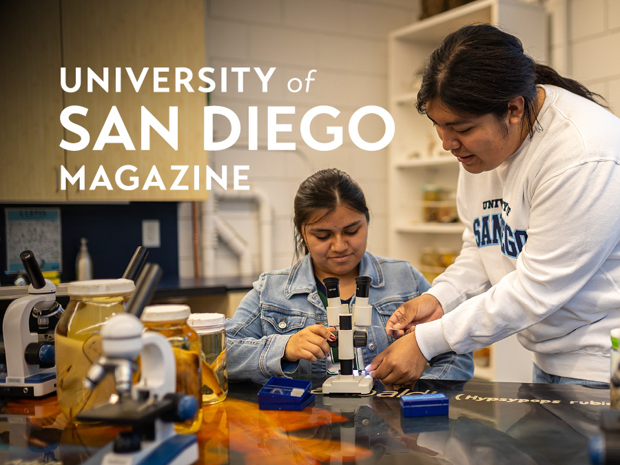 University of San Diego Magazine: Jace working with a student at the Ocean Discover Institute