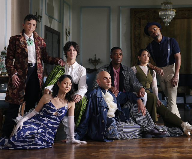 Photo of MFA Class of 2026 in the French Parlor, with dramatic lighting.