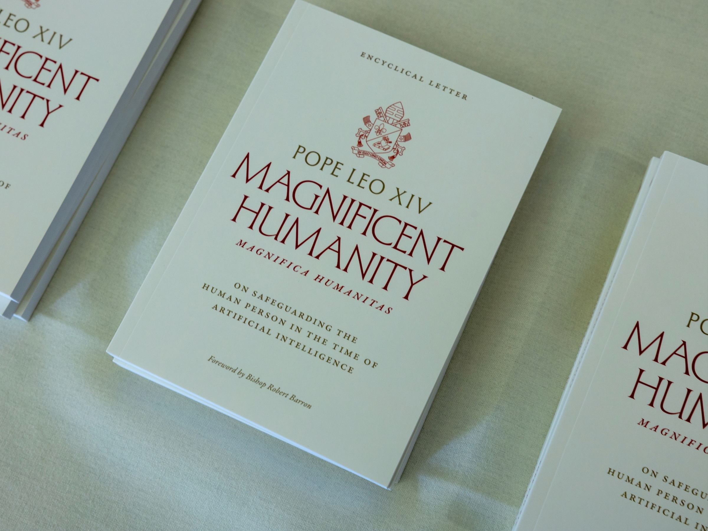 Books printed with the Pope's encyclical were given to attendees