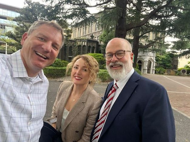 3 Knauss Faculty posing smiling