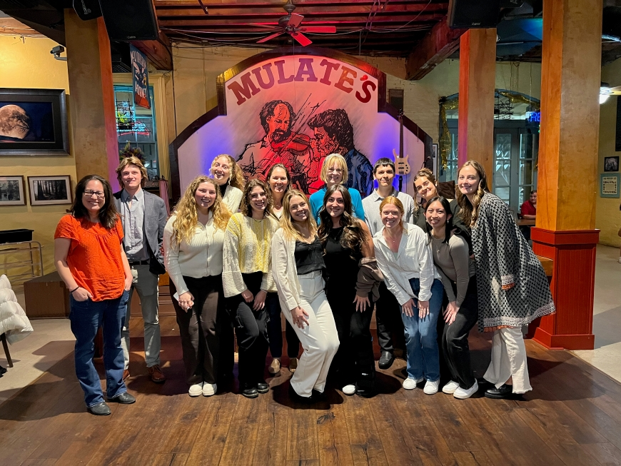 Group photo of students and faculty who attended OSM at Mulate's restaurant in New Orleans