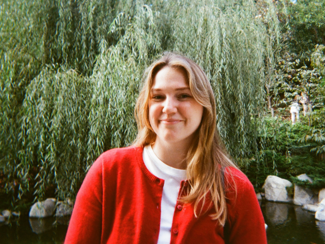 Headshot of Abigail Stallard in front a tree.