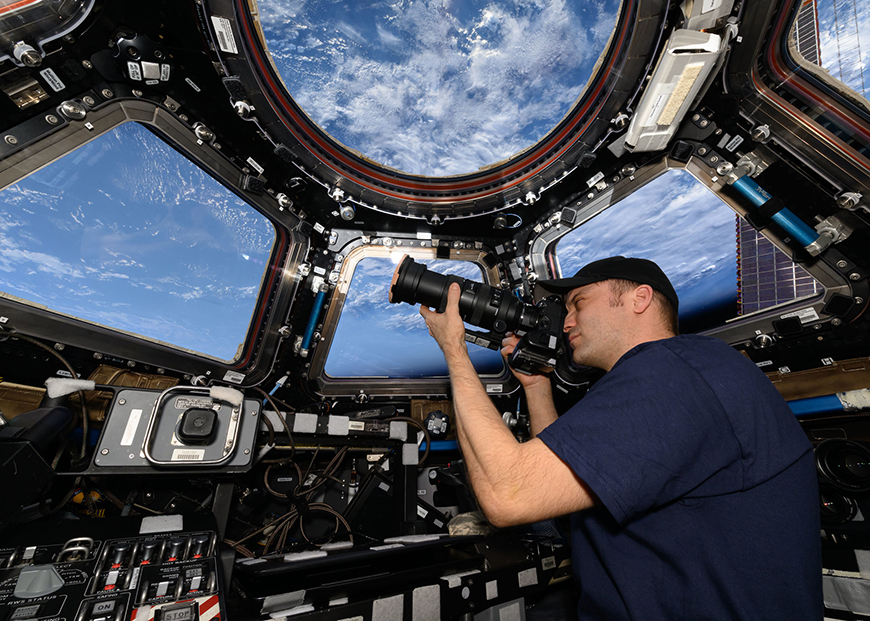 Matthew Dominick takes a photo