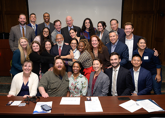 Brooks (center) with his students, past and present. (Photo by Lauren Radack)