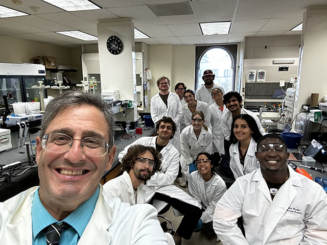 Dr. Joseph Provost selfie with his Fall 2025 CHEM/BIOL330 Techniques in Molecular Biology class.