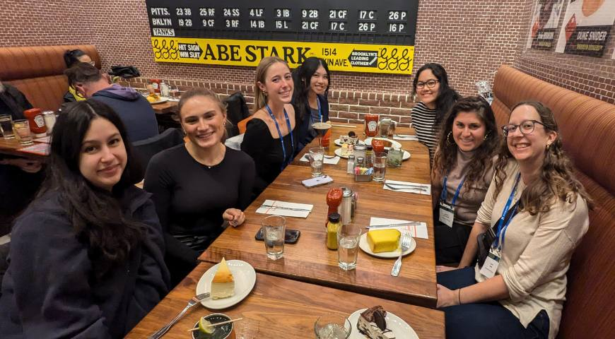 Isabella Ramirez, Kayla Phan, Gabriella Thomas, Lauren O'Donnell, Alexa Andrade and Rhiannon Novelli with Laura Getz, PhD, at a restaurant in NYC.